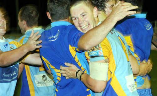 Dan McMah celebrates last year’s premiership. The talented centre will return from injury as the Devils push for their second title. Dan McMah celebrates last year’s premiership. The talented centre will return from injury as the Devils push for their second title.